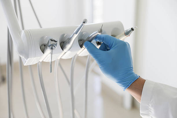 Professional Tooth Extraction technician working in Petersburg, VA